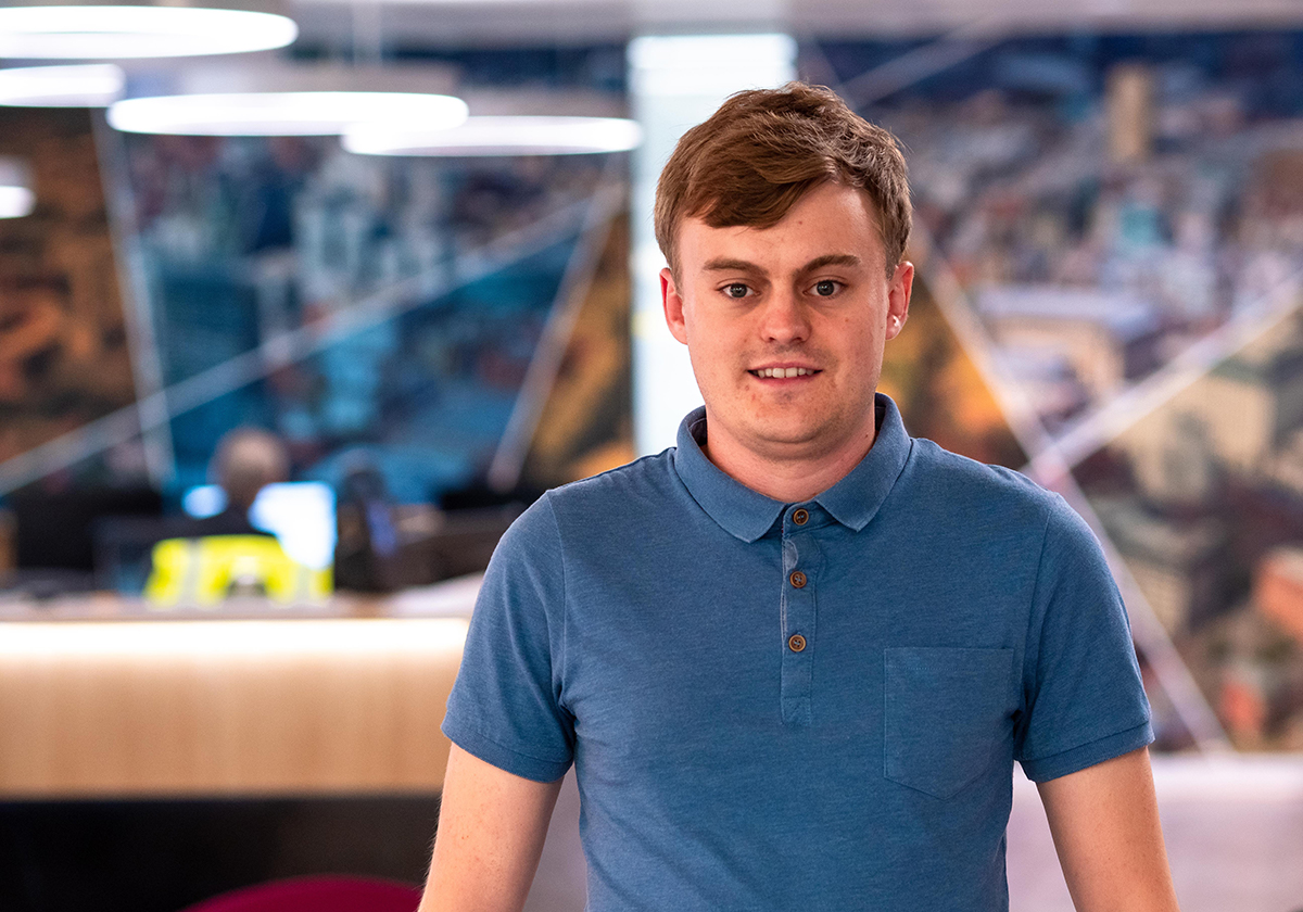 Software engineer Daniel Pomfret smiling at the camera